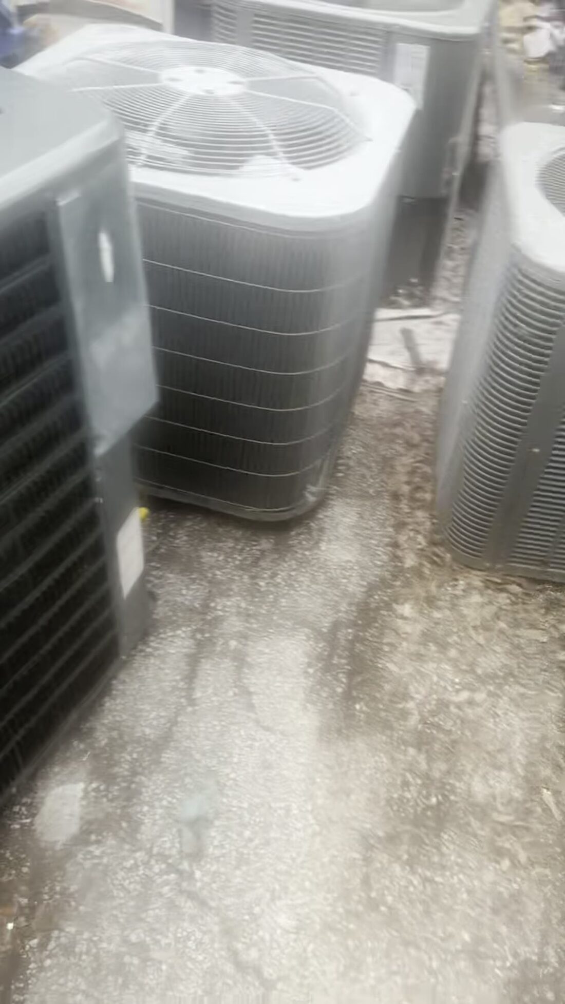 New condensers staged on the drive, waiting to go in.