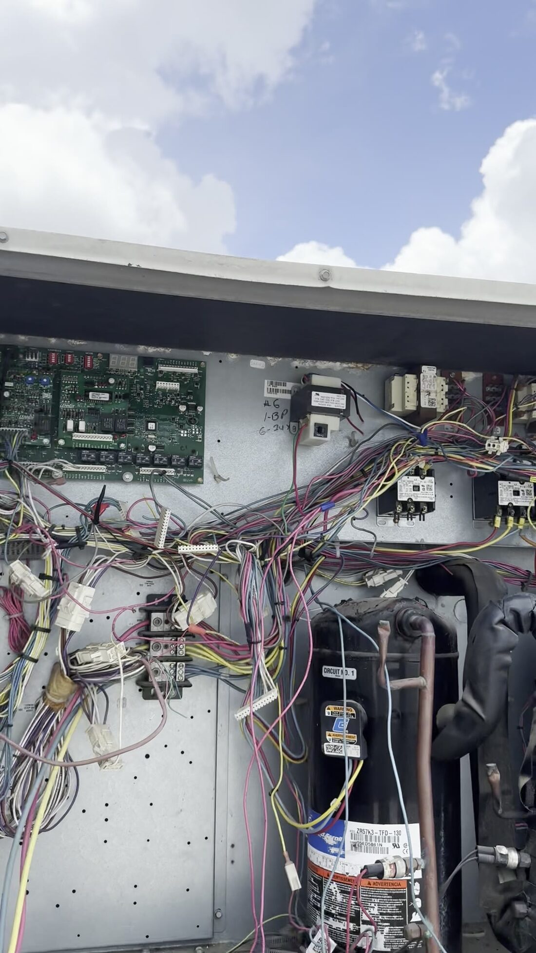Panel off. Board, contactors and the whole harness out in the open.