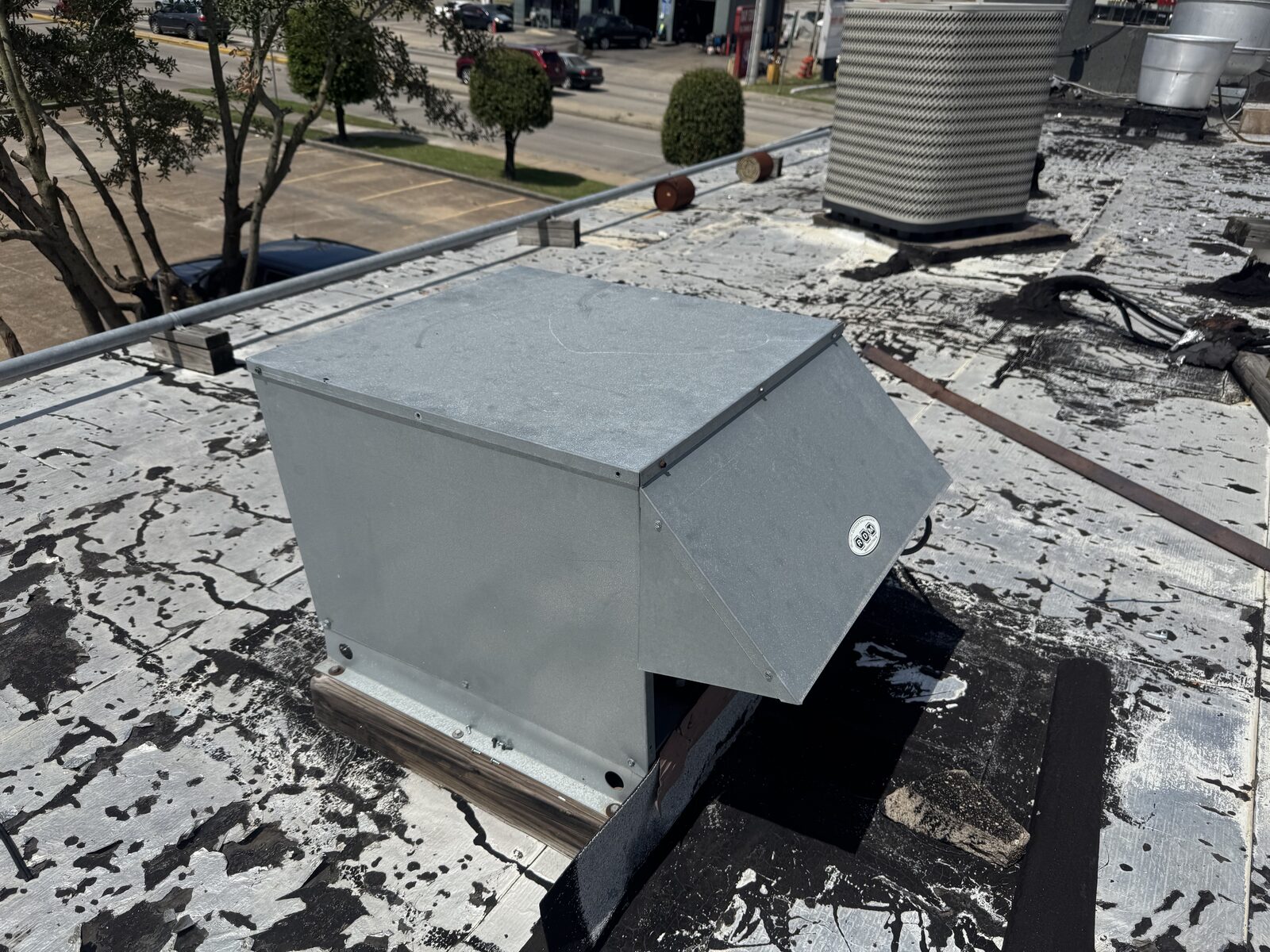 A large ducted plenum on a commercial roof
